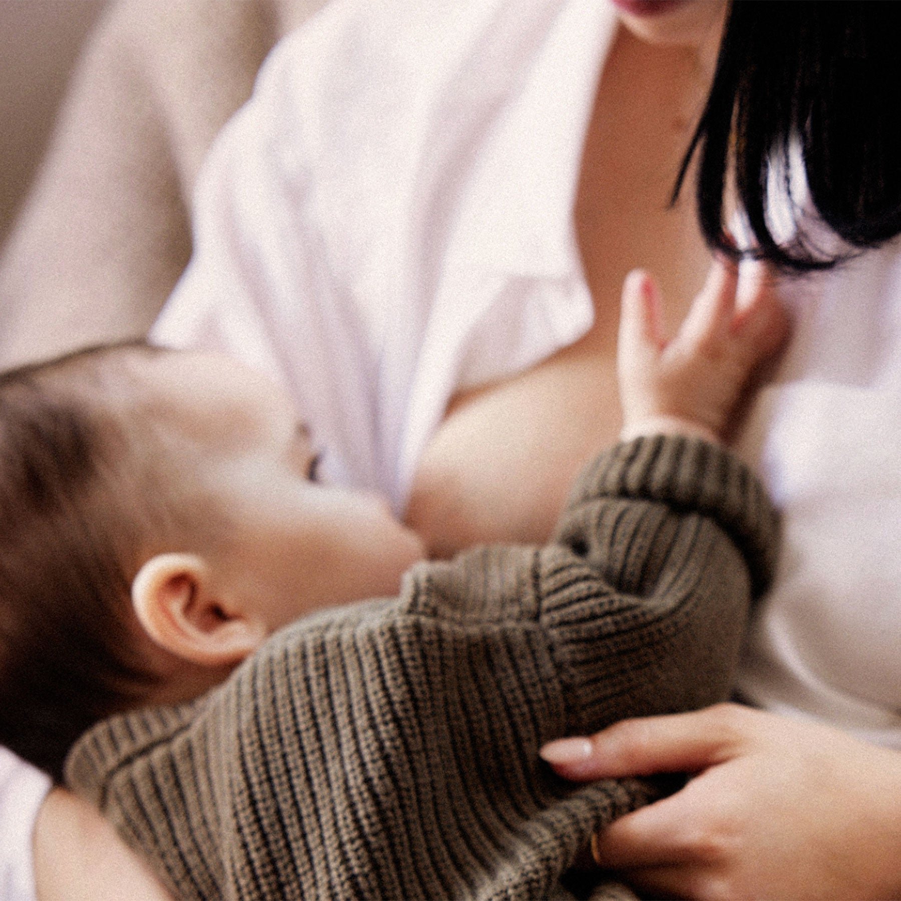 Woman Breastfeeding a Baby