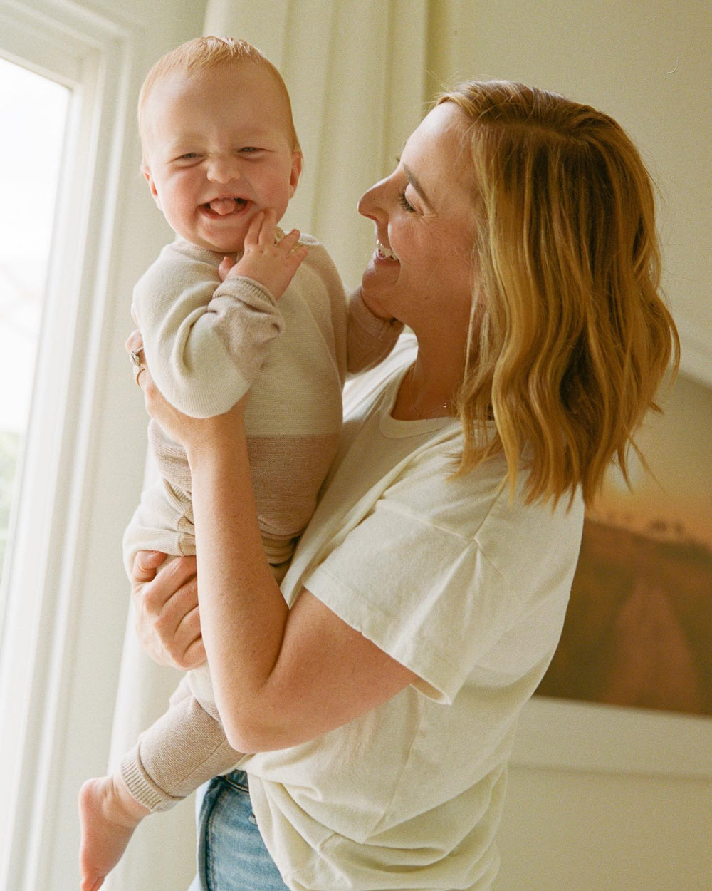 Chef Gaby Dalkin holding her baby