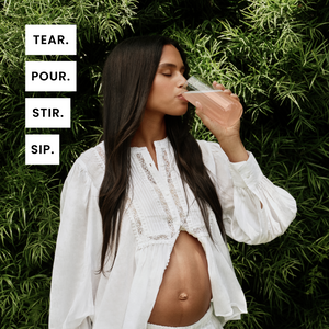Woman in a white outfit drinking from a glass against a green leafy background with text instructions.