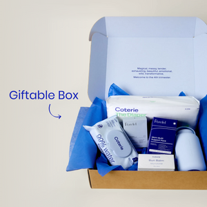 An open gift box filled with Perelel and Coterie products set against a plain light background with a 'Giftable Box' text overlay.
