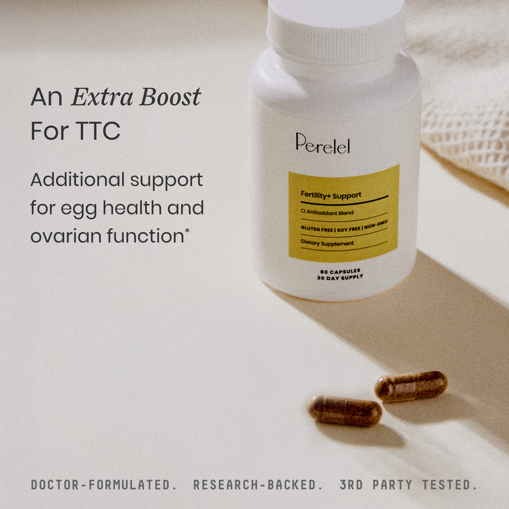 Perelel fertility support supplement bottle with capsules on a light surface