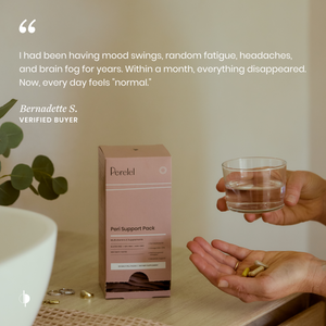 Person holding a glass of water and pills with a box labeled 'Perelet' on a table.