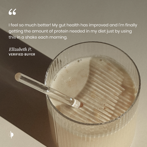 Glass of protein shake with a straw on a neutral background, featuring a verified buyer testimonial.