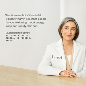 Dr. Bayati in a white lab coat with 'Perelel' logo, sitting at a table with text about the Women's Daily Vitamin Trio.